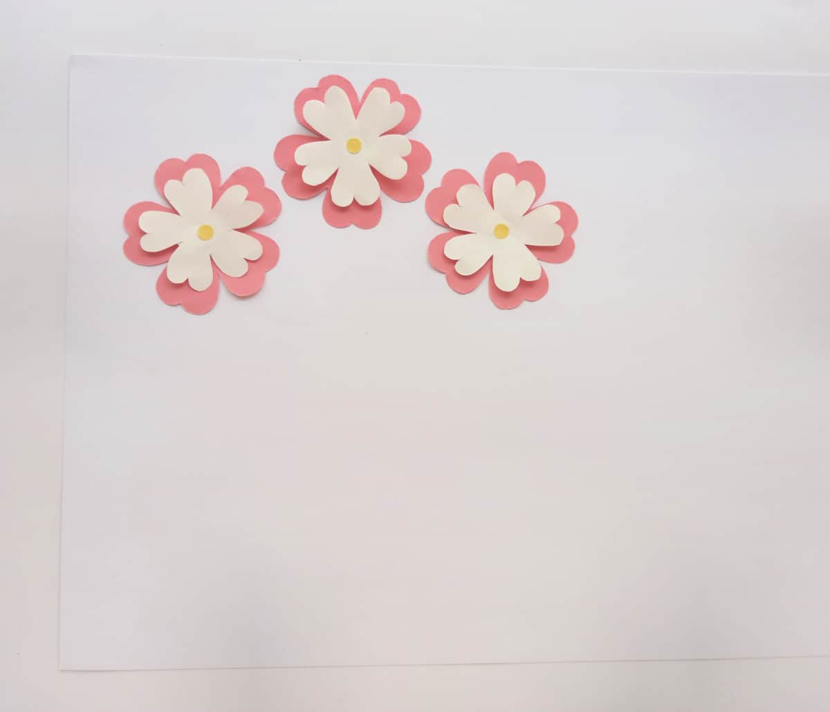 paper flowers on a white background