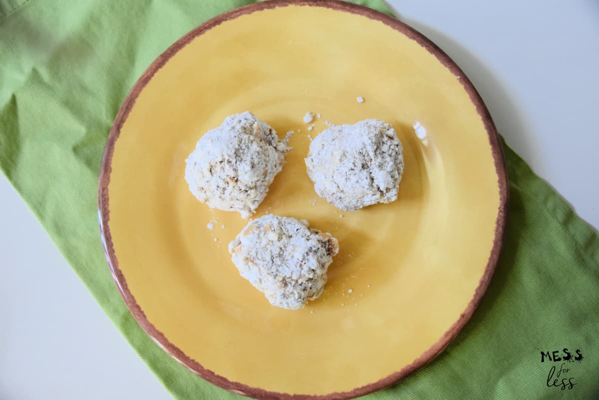 3 chocolate almond balls on plate