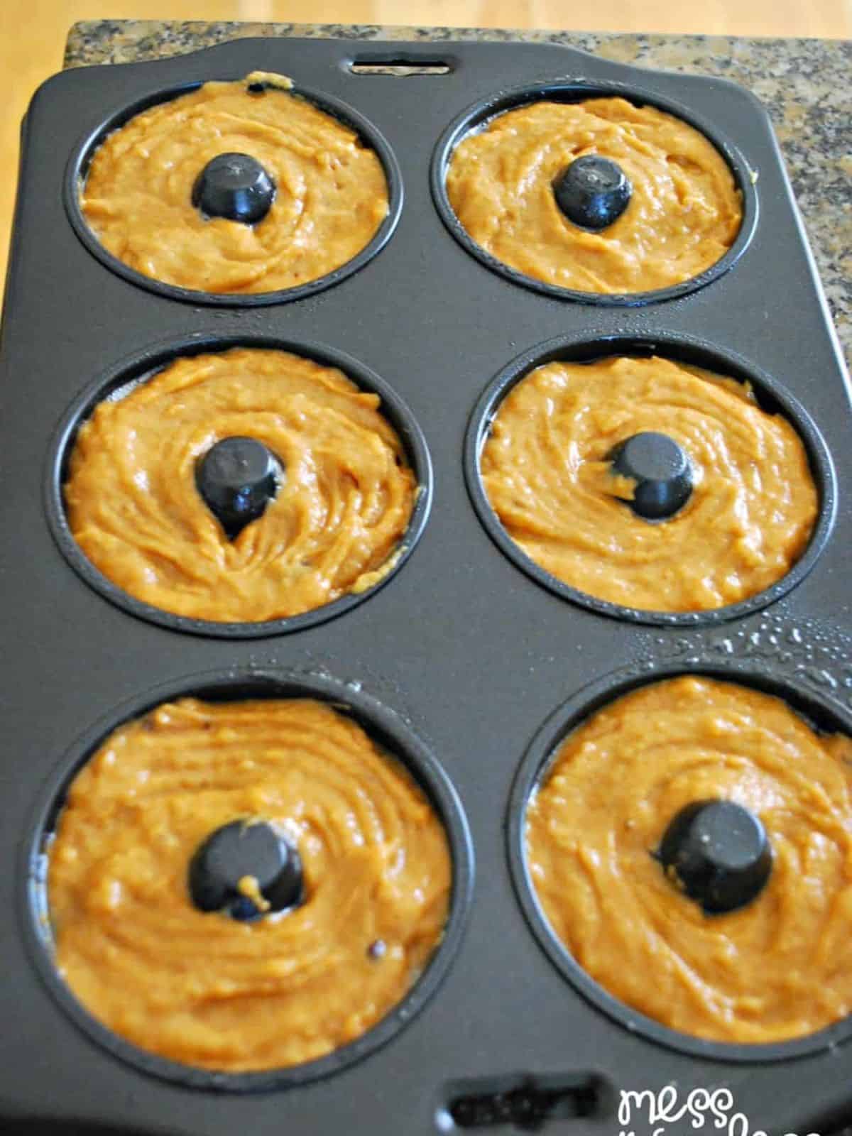 pumpkin donuts in a donut pan.