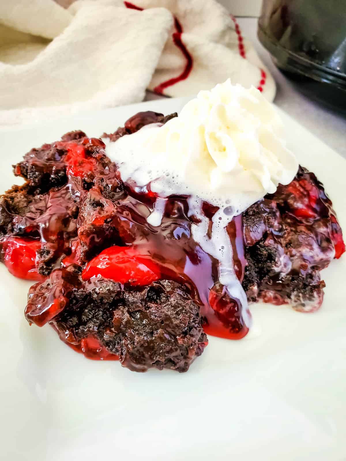 chocolate cherry dumpcake on plate