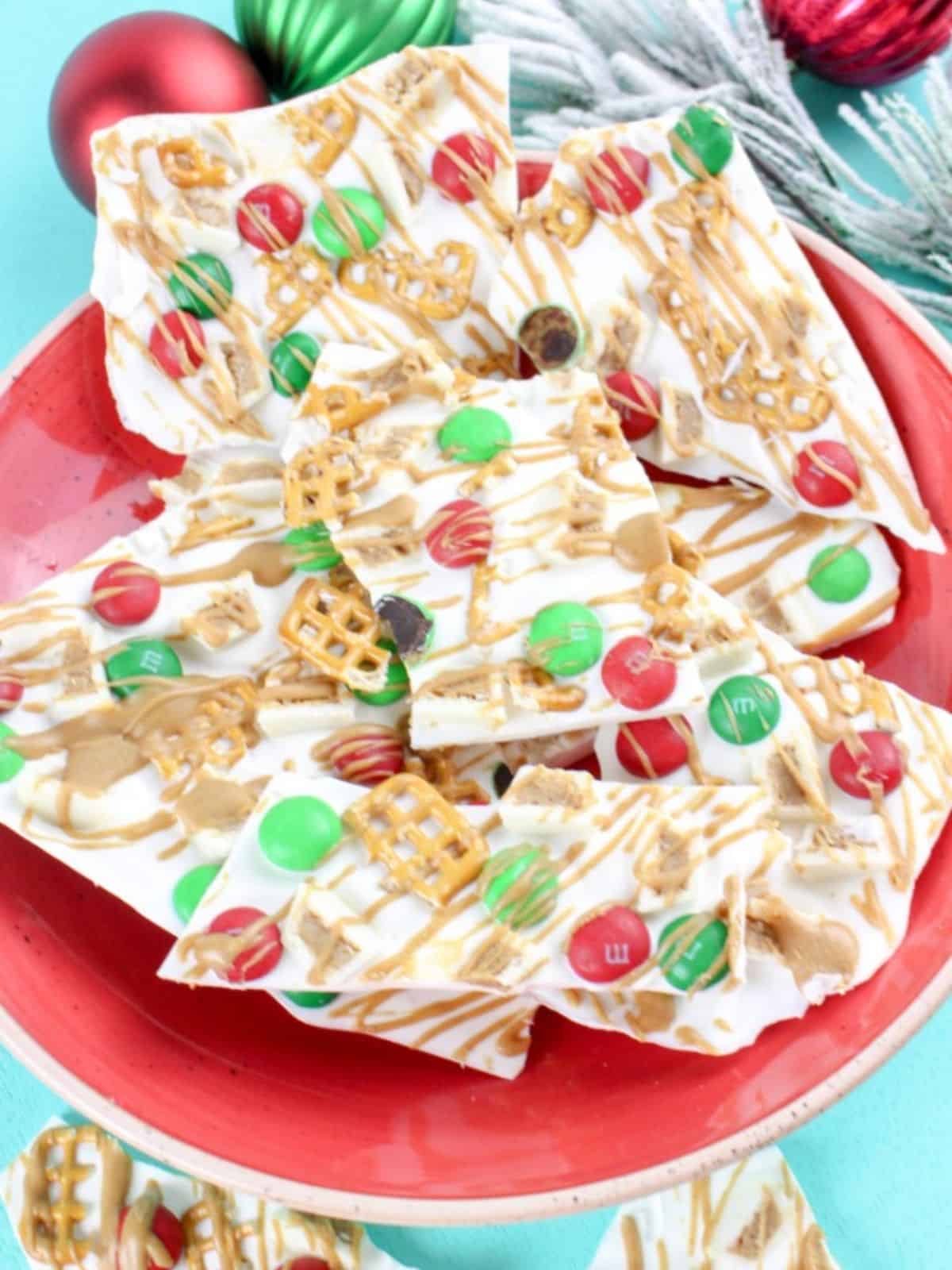 christmas bark on red plate.