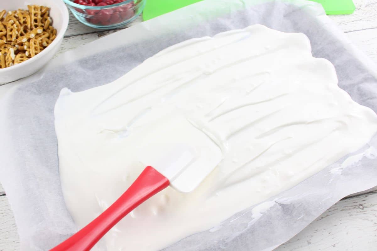 spreading candy melts on parchment paper