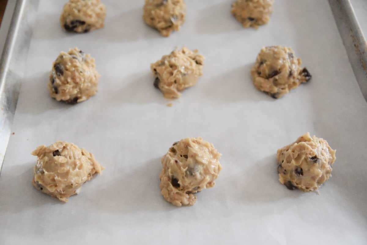 chocolate chip cookie dough on parchment lined pan