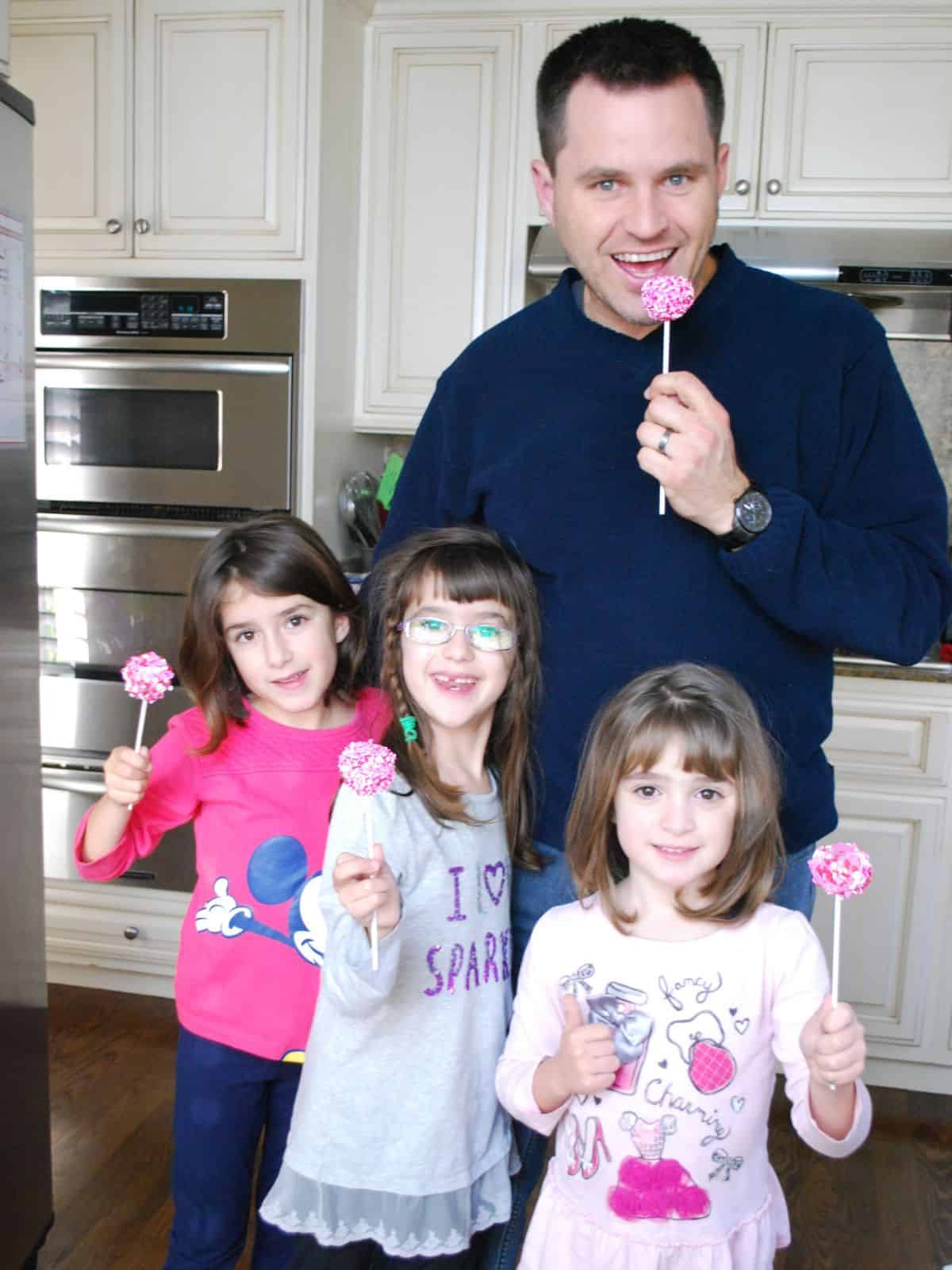 family enjoying brownie cake pops