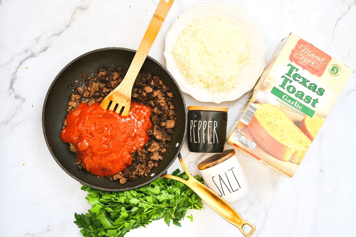 beef in a pan with sloppy joe mix