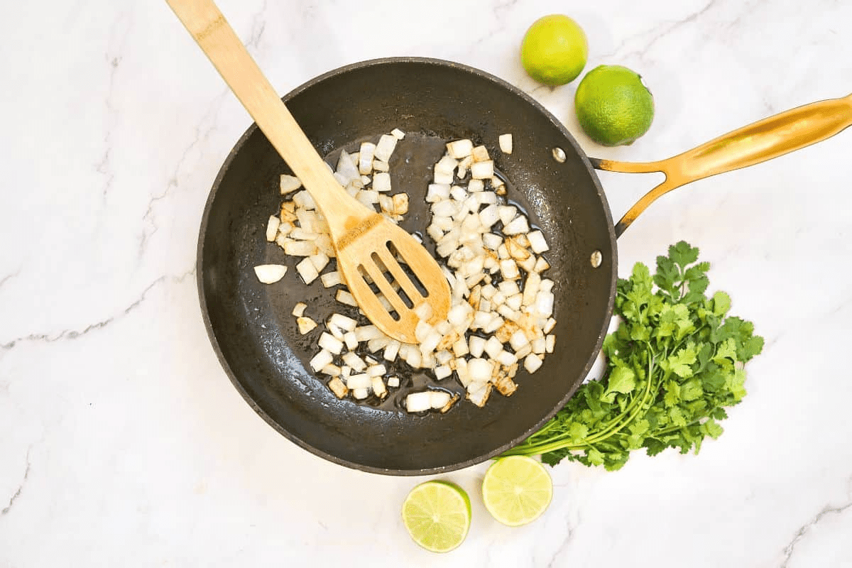 onions cooking in a pan