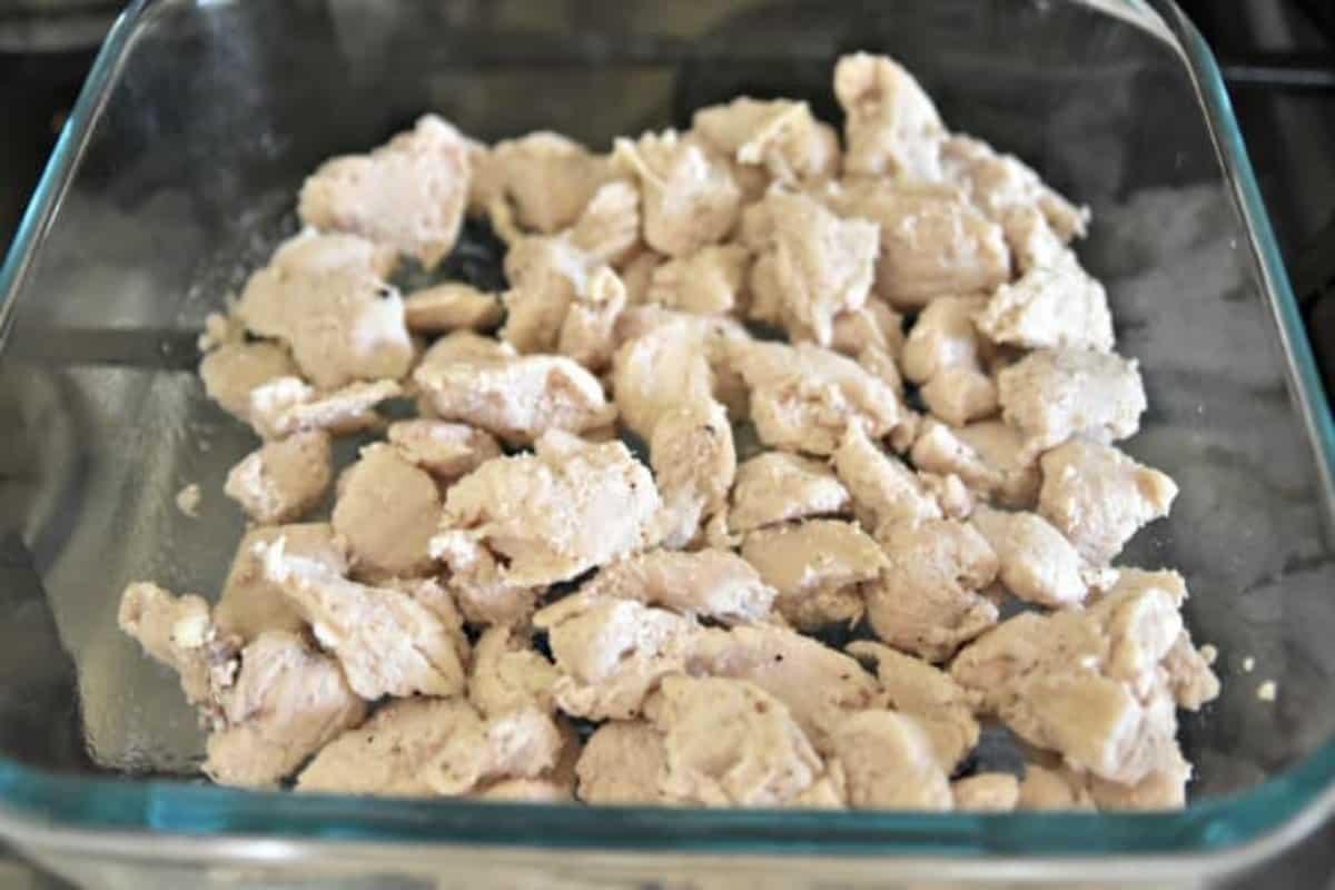 chopped up chicken in a pan