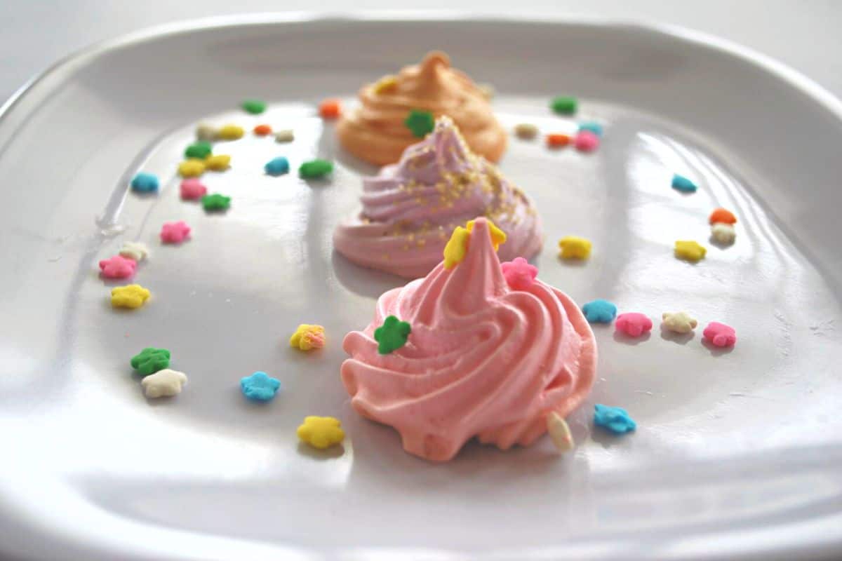 pink lavender and orange meringues.