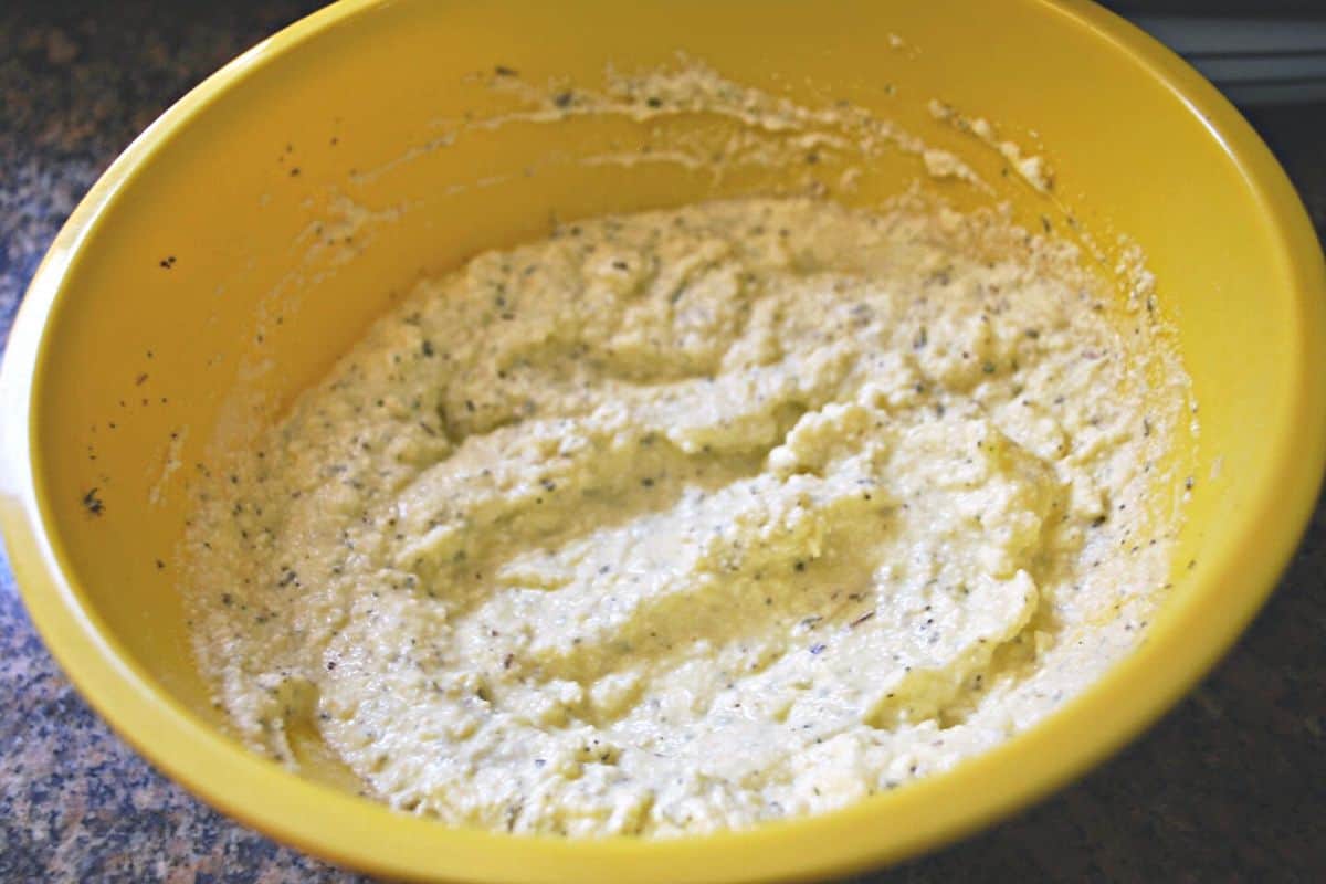 ricotta cheese mix in yellow bowl.