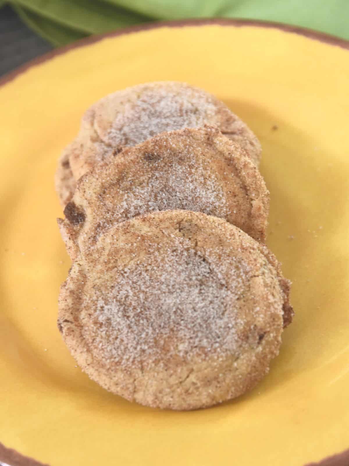 three snickerdoodle cookies on plate