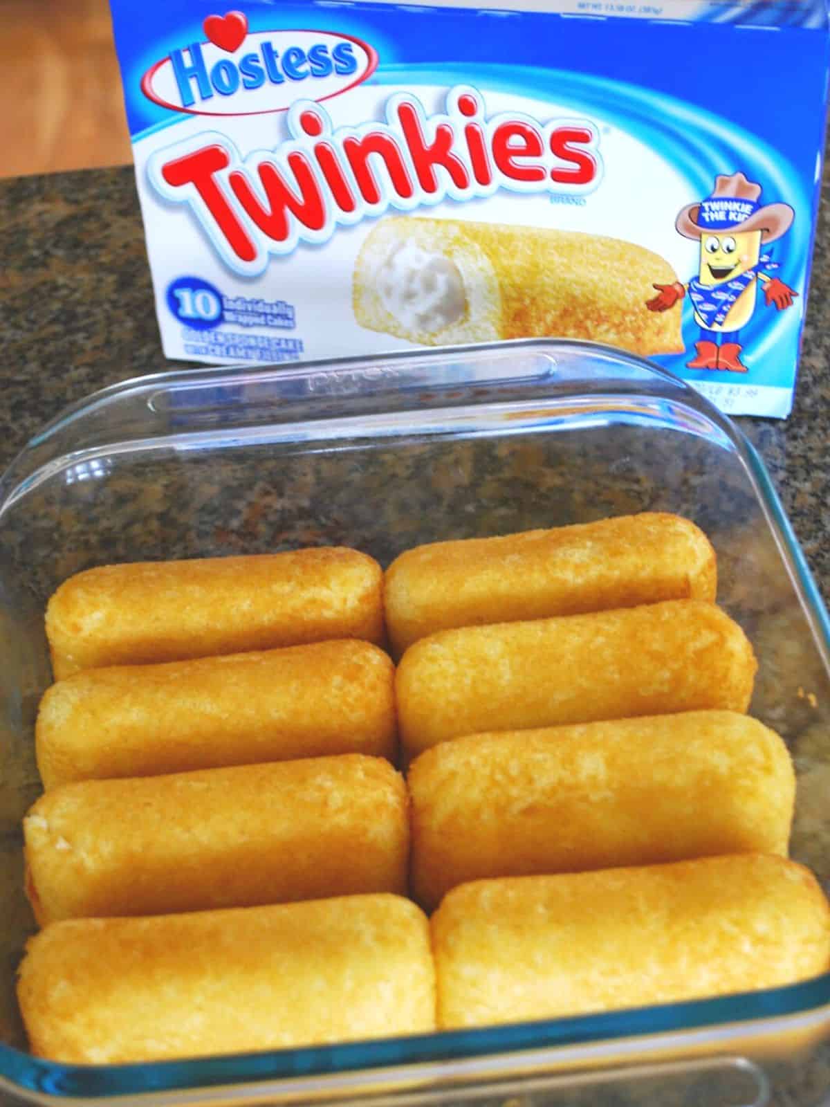 twinkies in pan with box of twinkies in background.