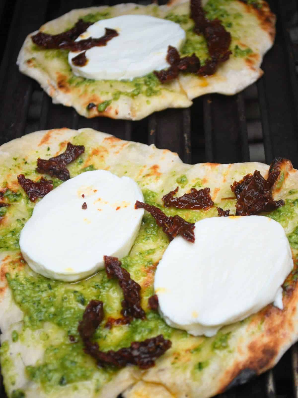 flatbread with pesto and mozzarella.