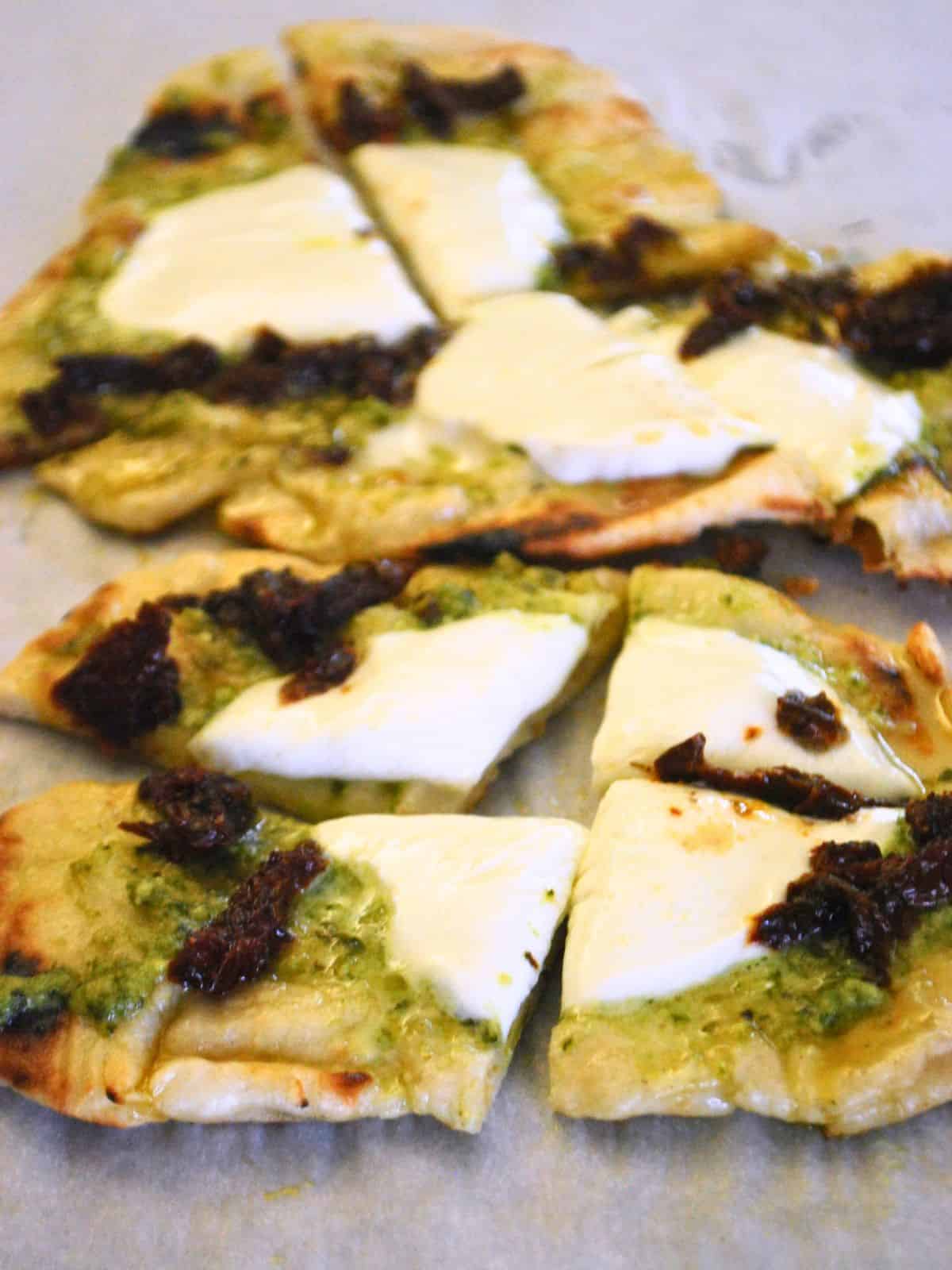 grilled flatbread with mozzarella and pesto