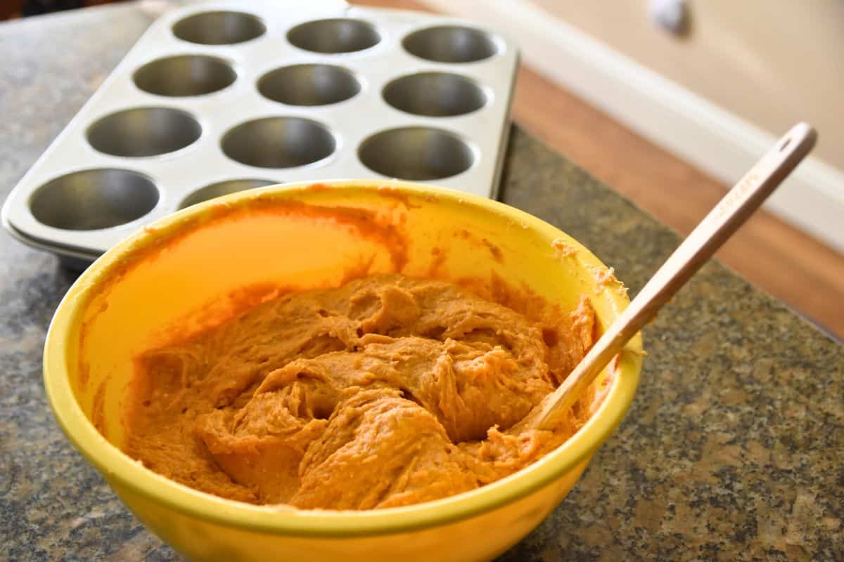 pumpkin muffin batter and muffin pan