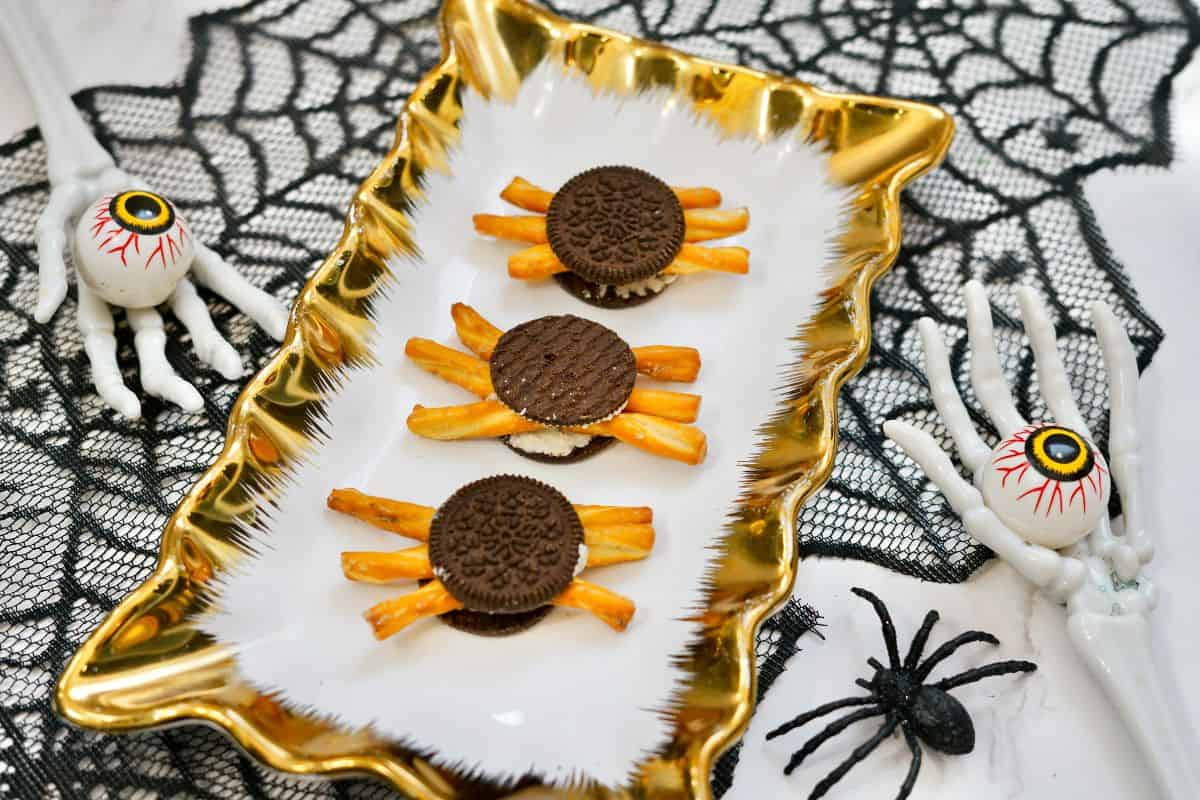 oreos with pretzels placed in them.