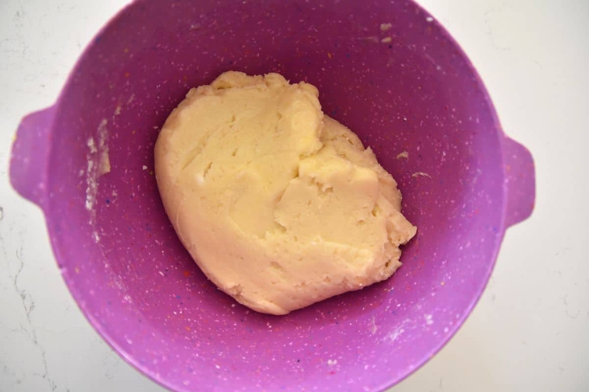 cookie dough in purple bowl