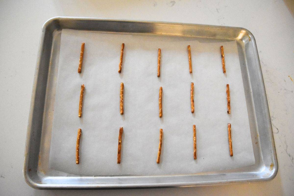 pretzel sticks on cookie sheet.