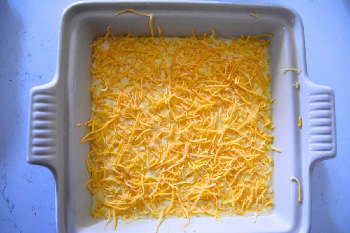 eggs and cheese in casserole dish.