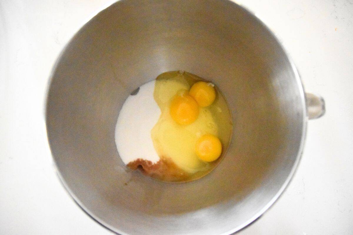 eggs, sugar, vanilla in mixer bowl.