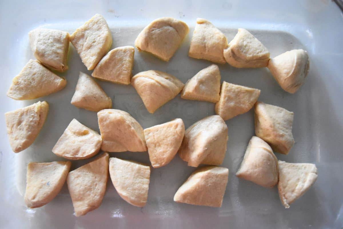 pieces of biscuits in baking dish