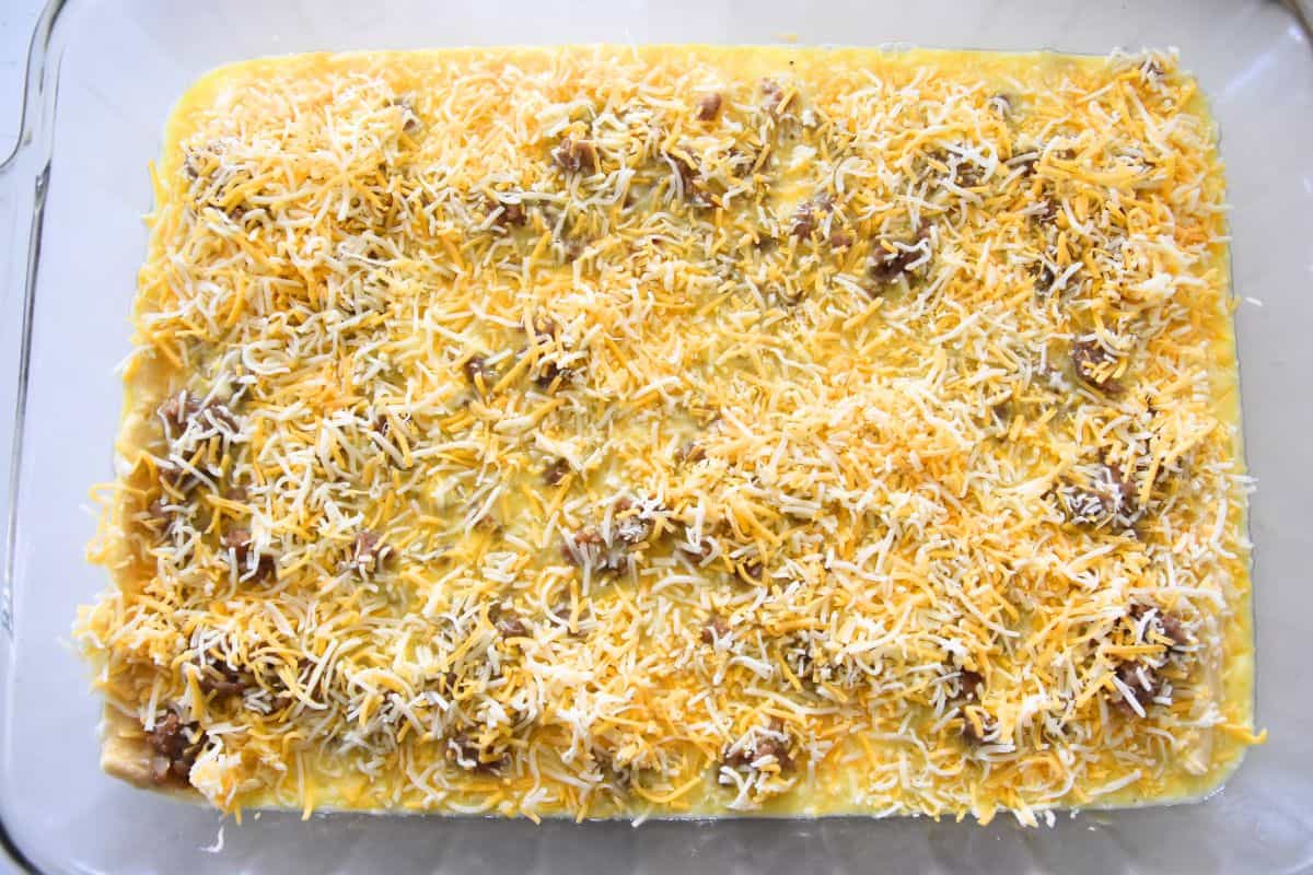 uncooked breakfast casserole with cheese.