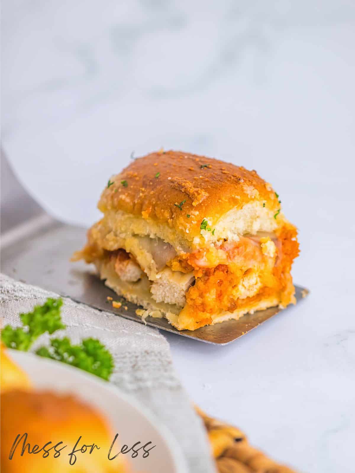 spatula with chicken slider