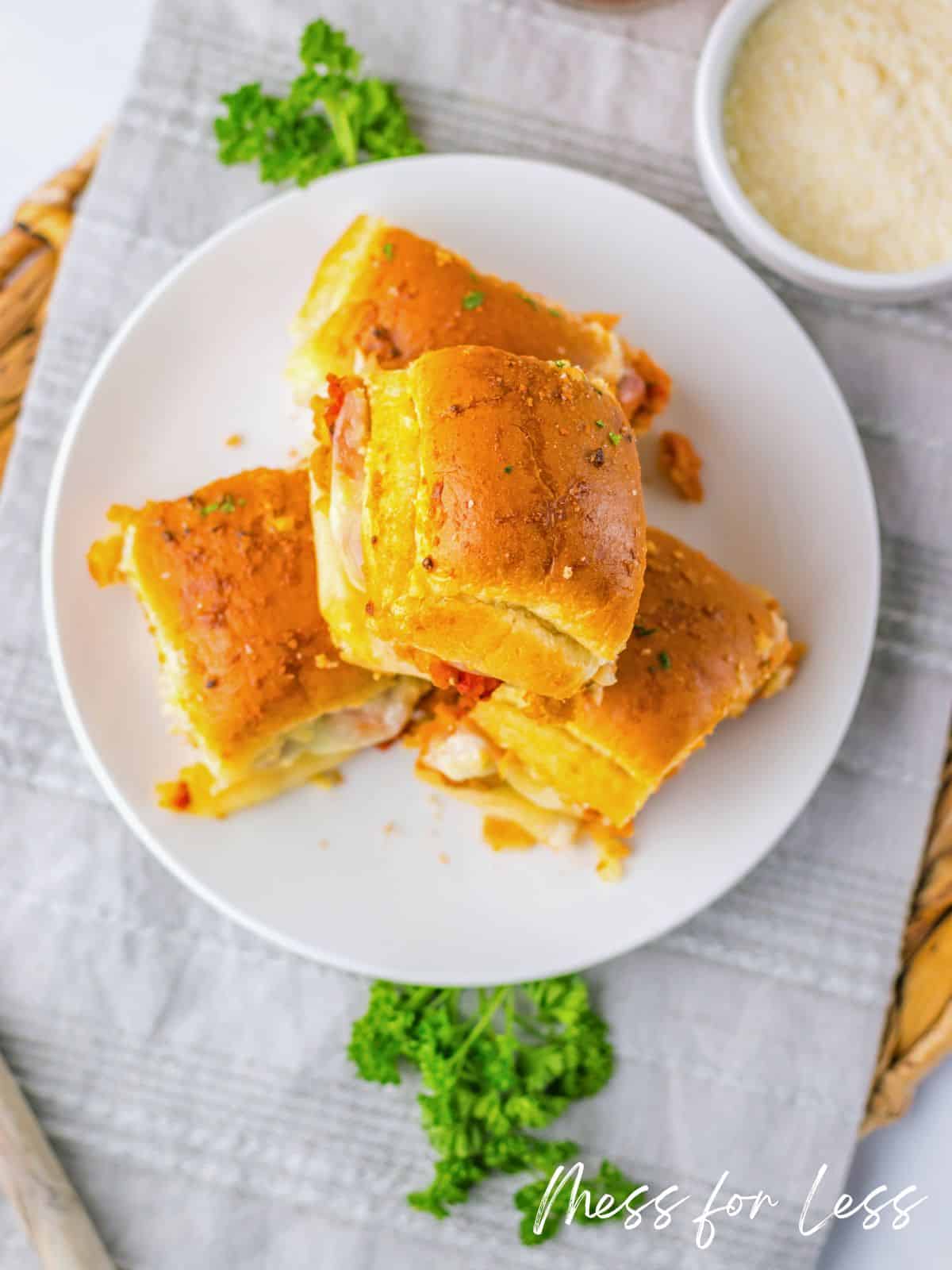 three chicken sliders on plate