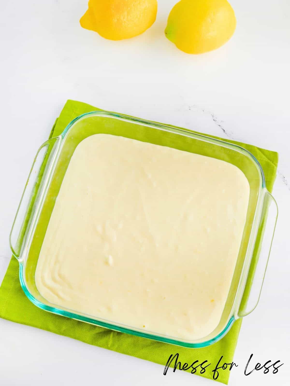 uncooked cheesecake bar batter in pan