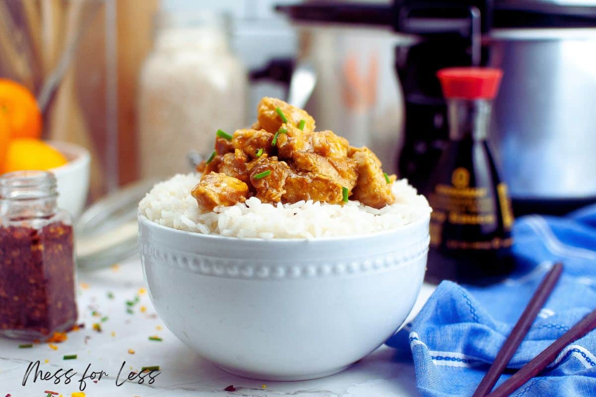 Orange chicken in white bowl