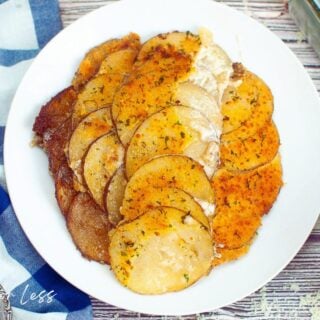 parmesan au gratin potatoes on plate