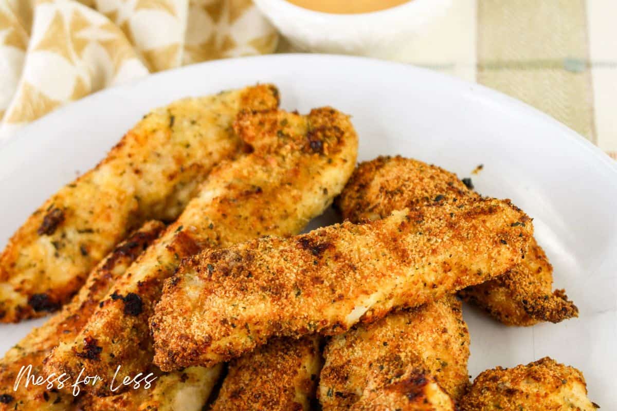 close up of breaded chicken on plate
