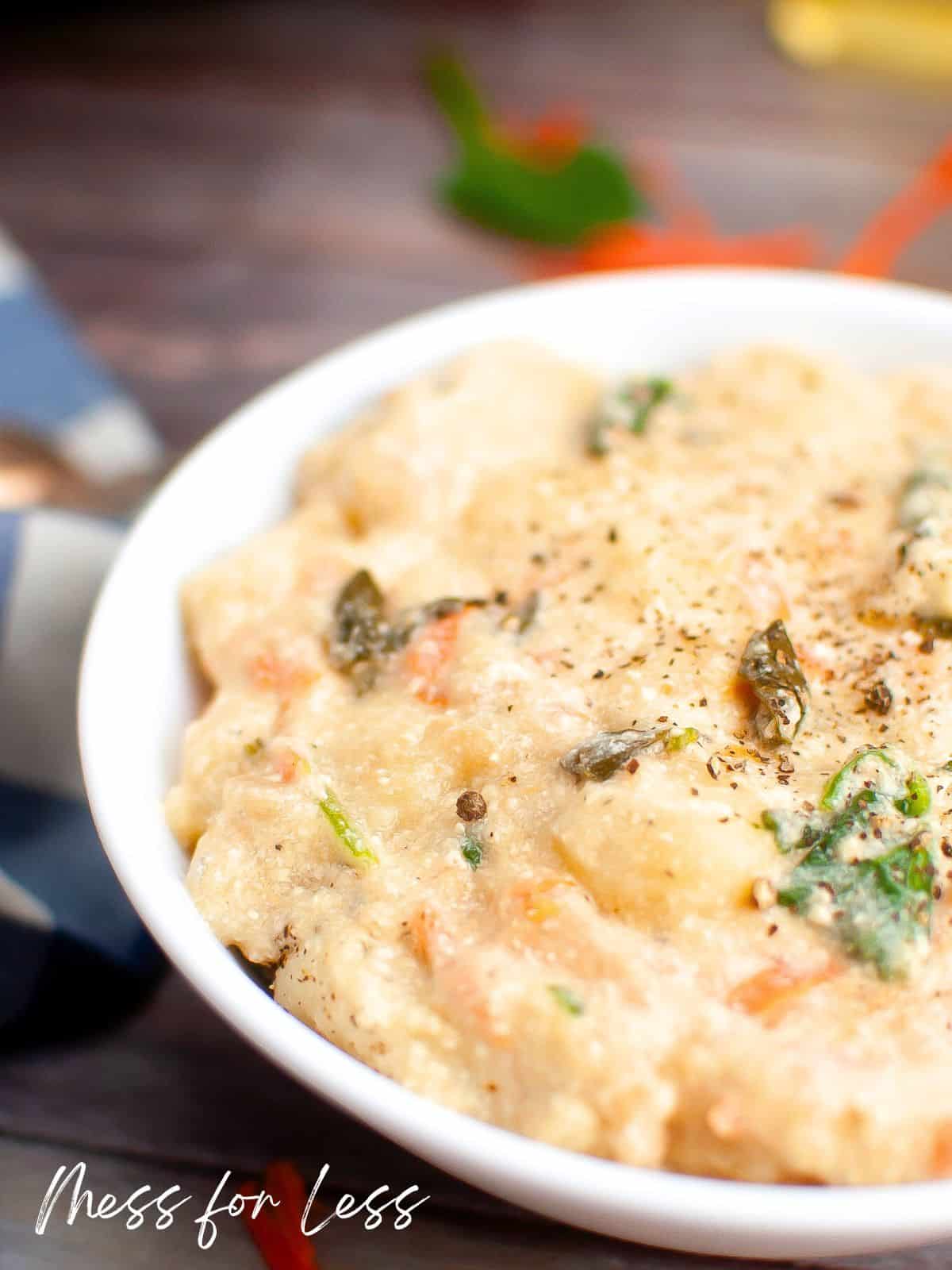 Olive Garden chicken gnocchi soup in white bowl