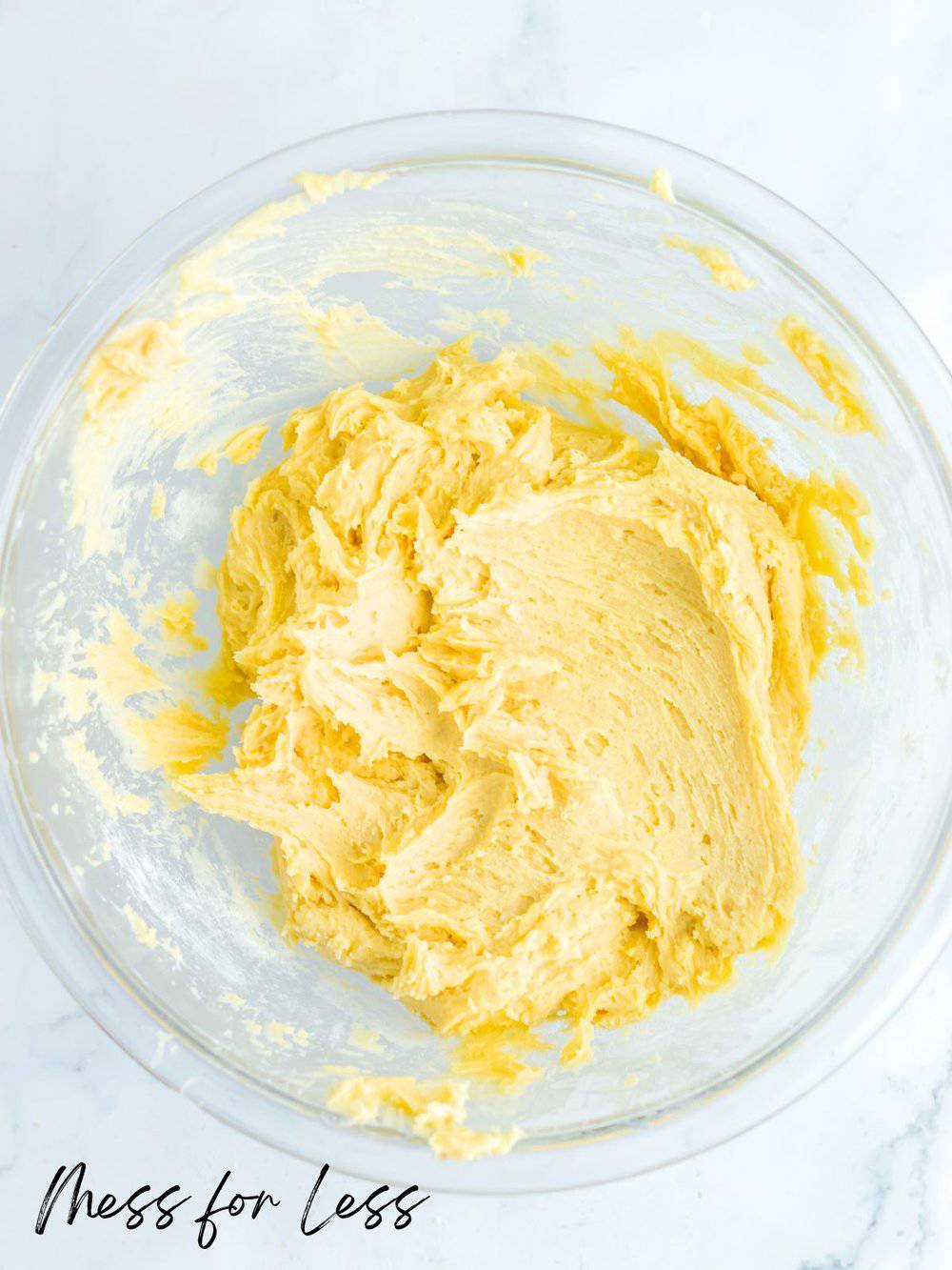 Butter and sugar creamed in bowl