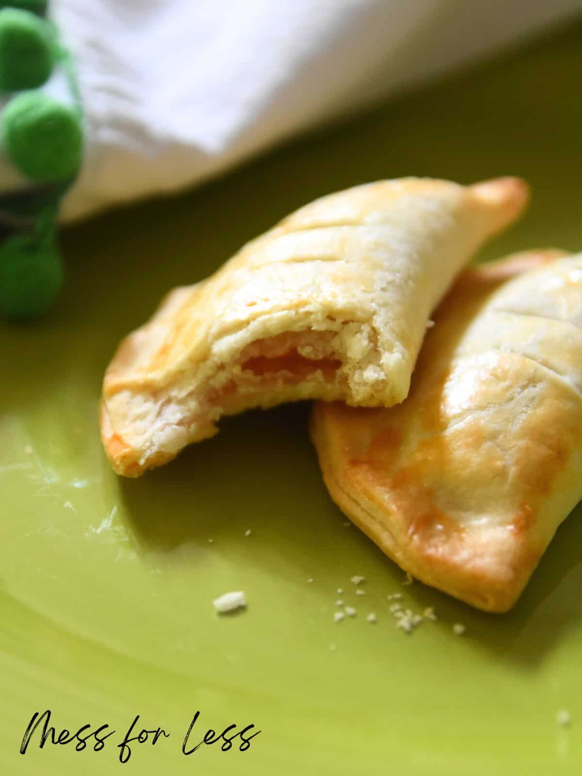 strawberry turnovers with a bite taken out of one