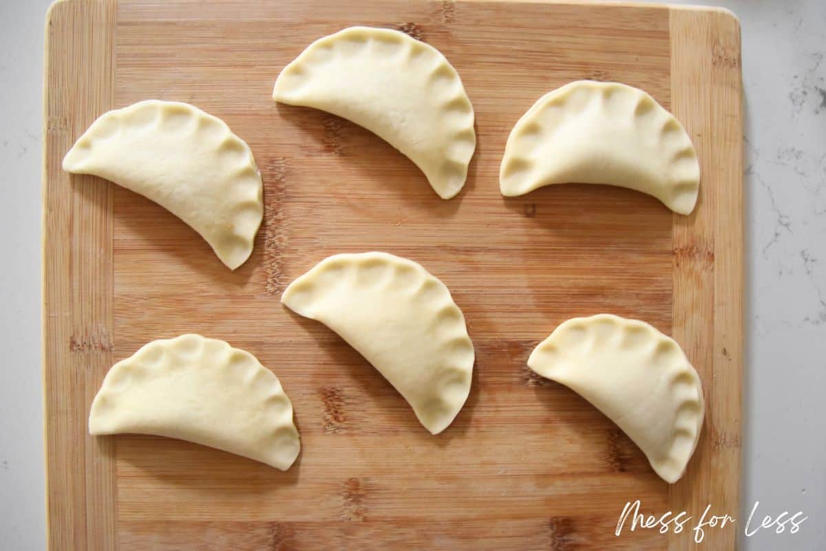 pie crust turnovers on cutting board