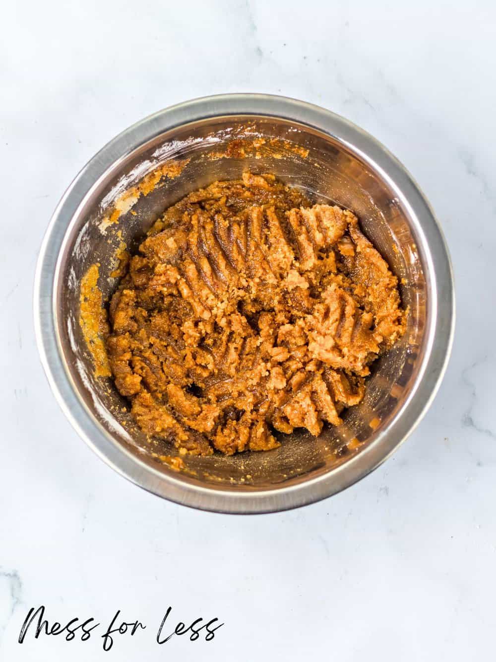 Mixing brown sugar in a bowl