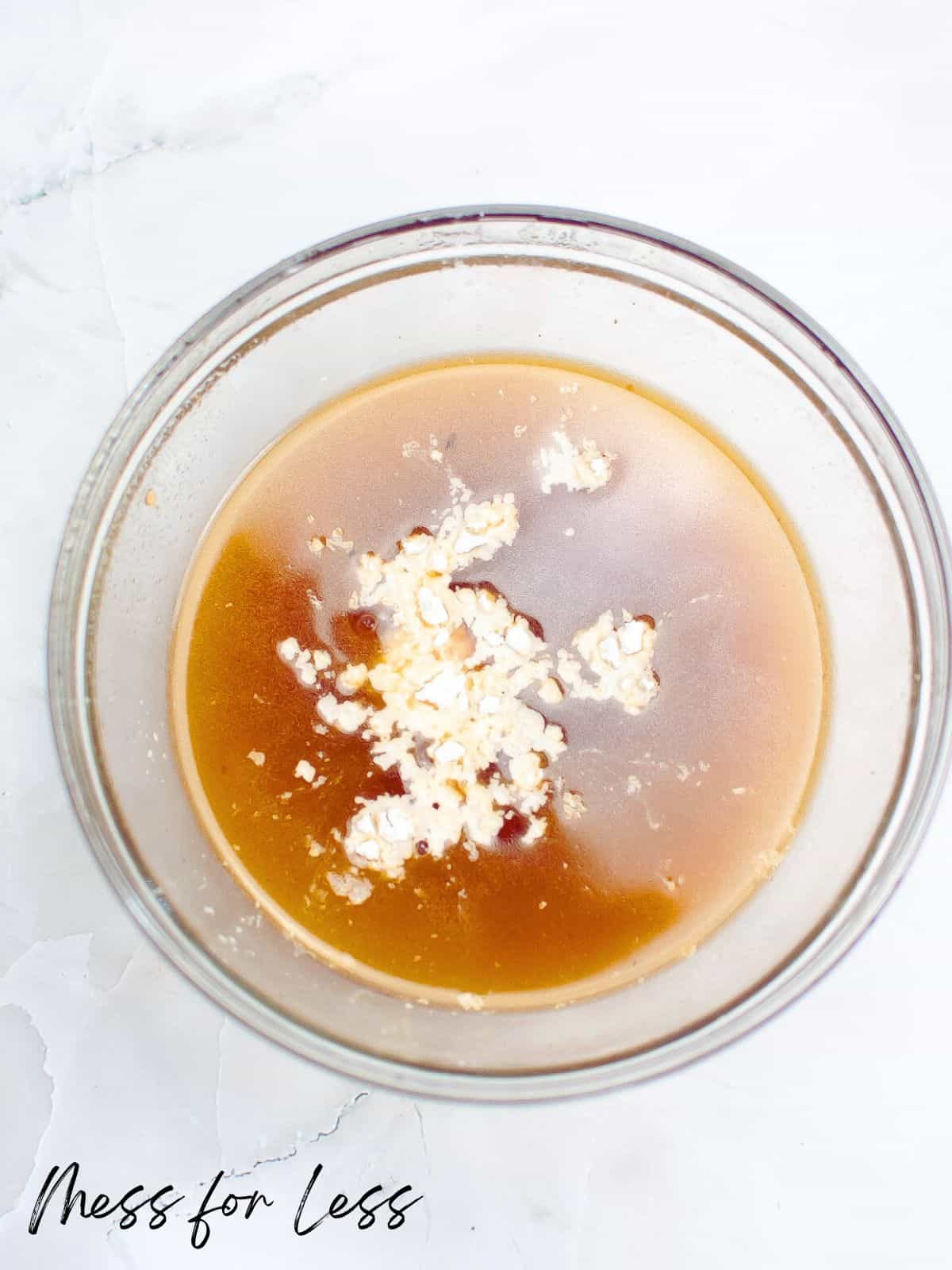 broth and cornstarch in bowl