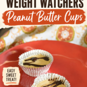 Two peanut butter cups in wrappers rest on a red plate, labeled as a simple 2-ingredient Weight Watchers peanut butter cups recipe.