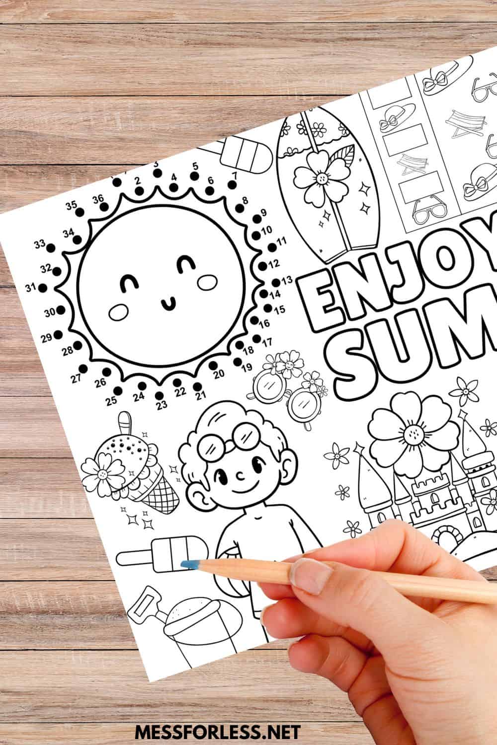 child's hand coloring a summer placemat